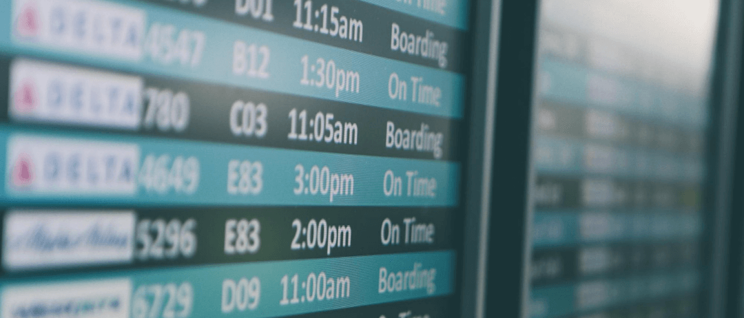 Close up of arrivals and departures board at an aiport