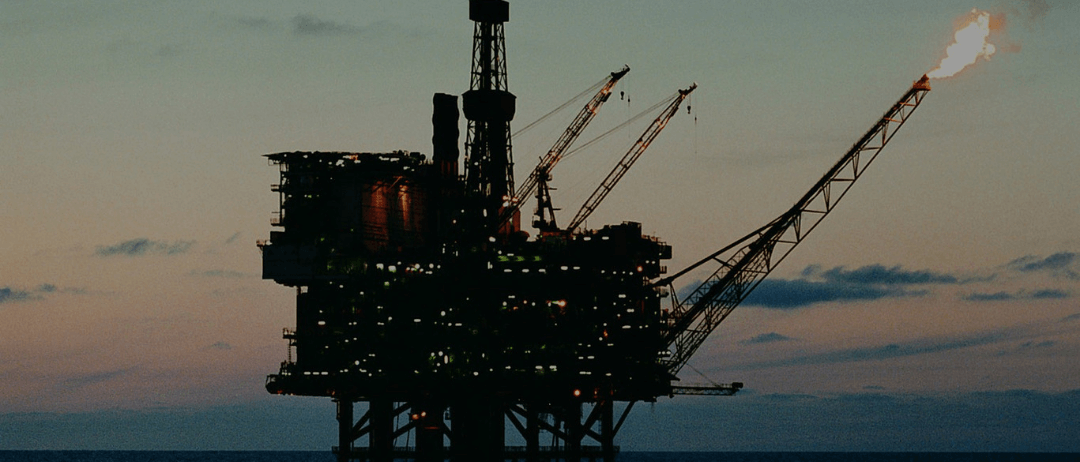 Oil rig in the evening time
